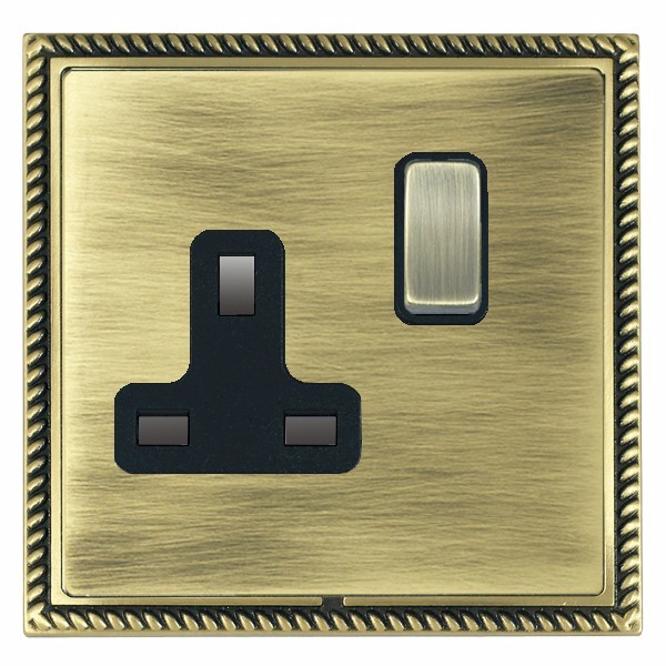 Linea-Georgian CFX Antique Brass Frame/Antique Brass Front 1 gang 13A Double Pole Switched Socket Antique Brass/Black