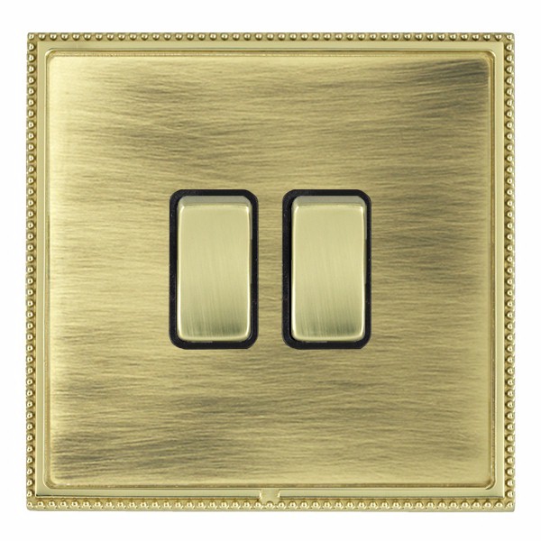 Linea-Perlina CFX Polished Brass Frame/Antique Brass Front 2 gang 20AX 2 Way Rocker Polished Brass/Black