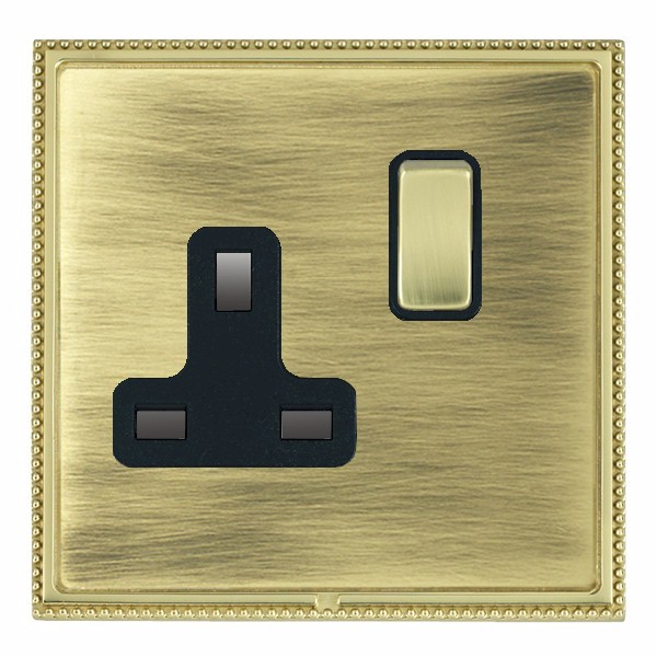 Linea-Perlina CFX Polished Brass Frame/Antique Brass Front 1 gang 13A Double Pole Switched Socket Polished Brass/Black